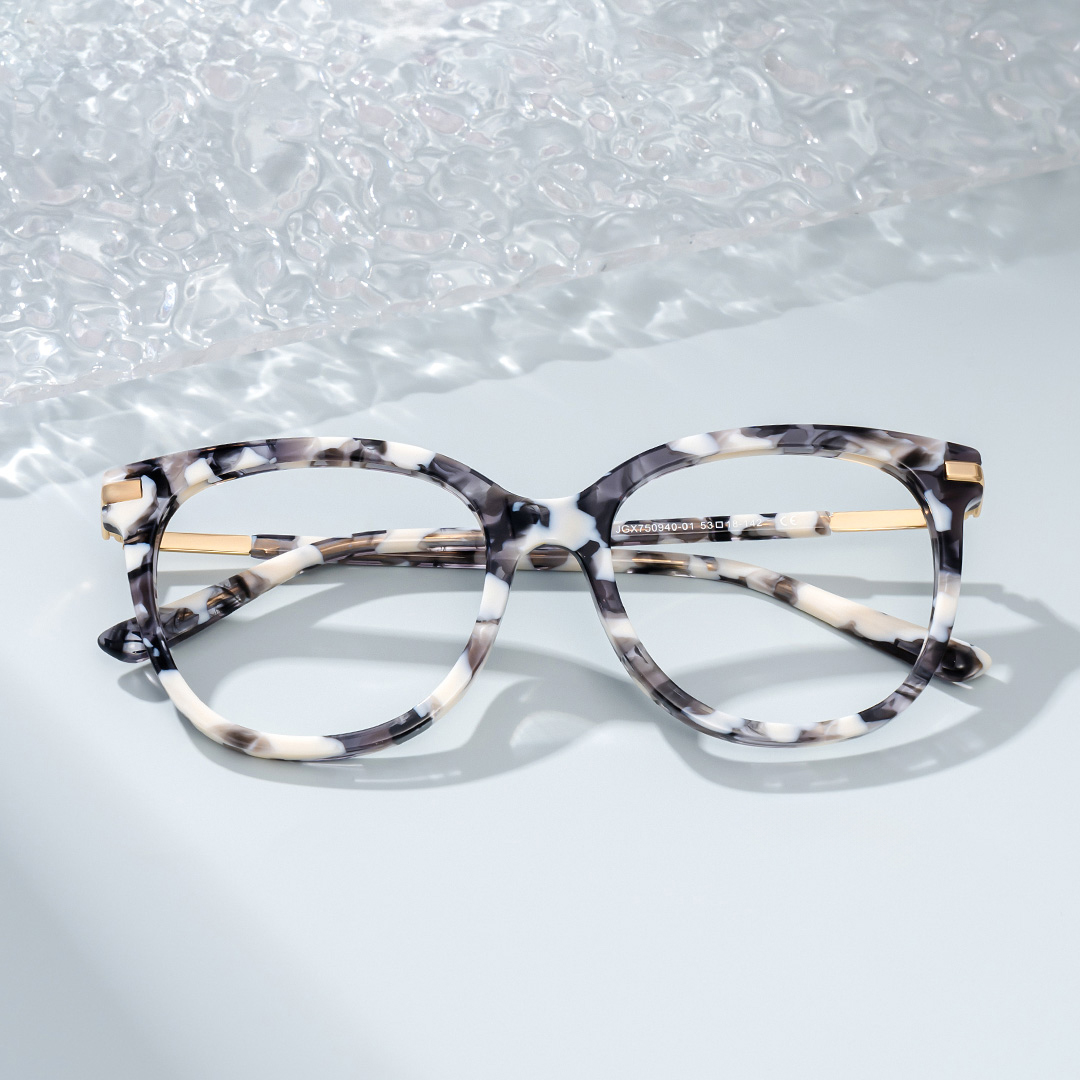Round Grey Glasses With a Marble Pattern1