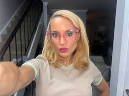 I love these oversized pink eyeglasses. fun and fashionable.0